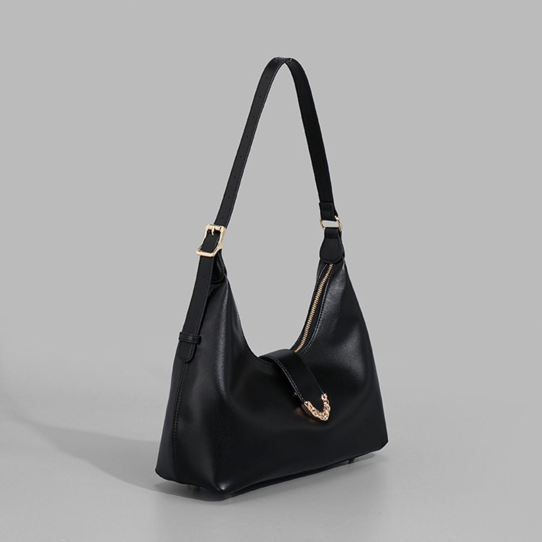 Chamberlain Gold Handtasche