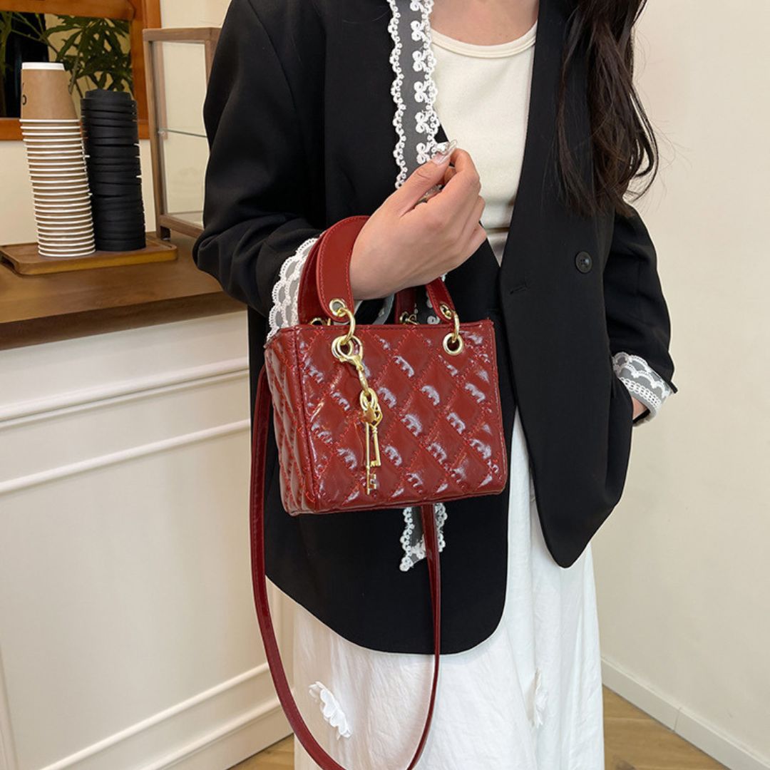 Ornement de Reine Handtasche