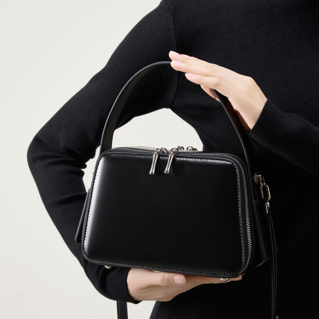 Korallenflügel-Handtasche