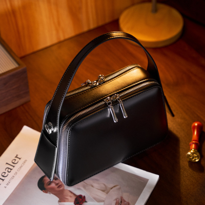 Korallenflügel-Handtasche