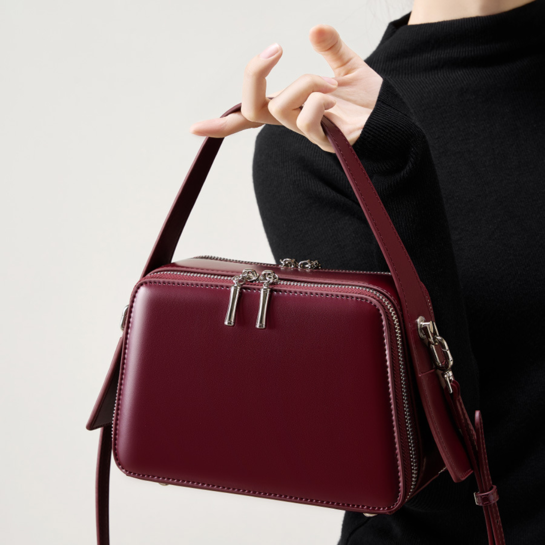 Korallenflügel-Handtasche