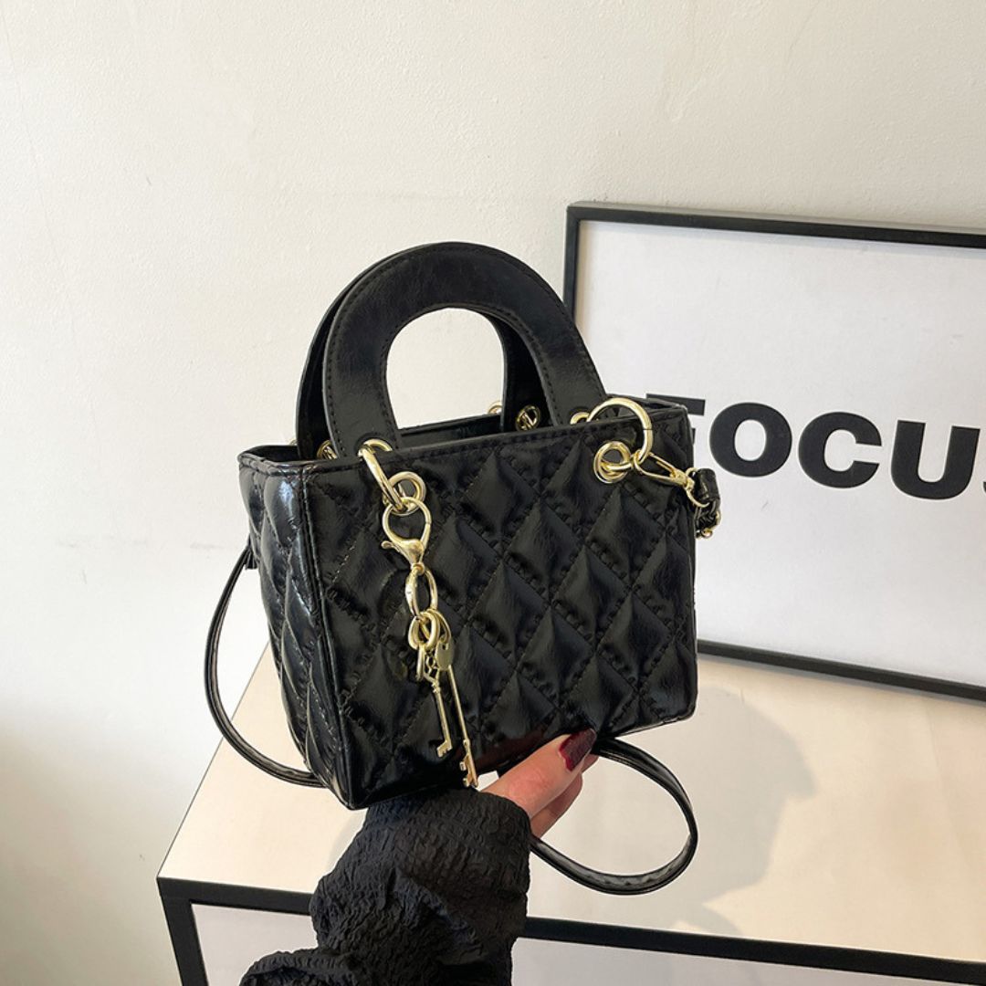 Ornement de Reine Handtasche