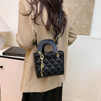 Ornement de Reine Handtasche