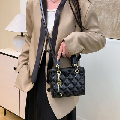 Ornement de Reine Handtasche