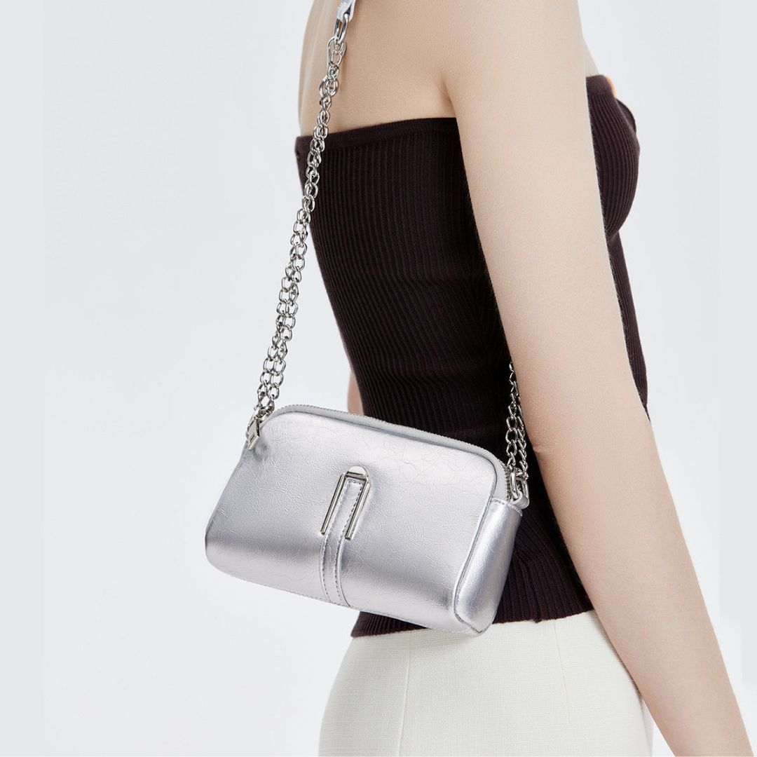 Sérénité d’Ivoire Handtasche