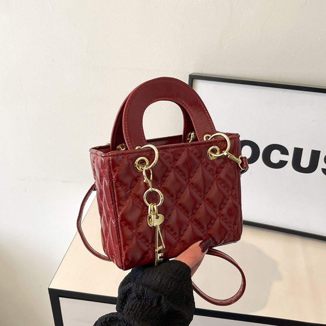 Ornement de Reine Handtasche